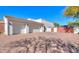 Three-car garage with automatic doors and paver driveway at 922 E Desert Hills Estate Dr, Phoenix, AZ 85086