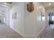 Bright hallway with hardwood floors and access to other rooms at 922 E Desert Hills Estate Dr, Phoenix, AZ 85086