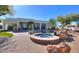 Spacious backyard oasis with a hot tub and built-in seating at 922 E Desert Hills Estate Dr, Phoenix, AZ 85086