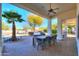 Outdoor patio dining area with seating for six at 922 E Desert Hills Estate Dr, Phoenix, AZ 85086