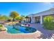 Inviting kidney-shaped pool with a spacious patio area at 922 E Desert Hills Estate Dr, Phoenix, AZ 85086