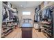 Large walk-in closet with ample shelving and rod space at 922 E Desert Hills Estate Dr, Phoenix, AZ 85086