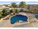 Aerial view of a luxurious pool and backyard oasis at 9255 W Buckskin Trl, Peoria, AZ 85383