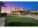 Luxury home with putting green, pool, and expansive backyard at 9255 W Buckskin Trl, Peoria, AZ 85383