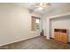 Bedroom with window, closet, and ceiling fan at 9255 W Buckskin Trl, Peoria, AZ 85383