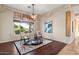 Bright living room with hardwood floors and large window at 9255 W Buckskin Trl, Peoria, AZ 85383