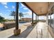 Covered patio overlooking a sparkling pool and jacuzzi at 9255 W Buckskin Trl, Peoria, AZ 85383