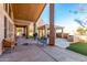 Covered patio with seating area and built-in grill at 928 E Valencia Dr, Phoenix, AZ 85042