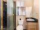 Small bathroom with shower, toilet and vanity at 928 E Valencia Dr, Phoenix, AZ 85042