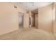 Well-lit bedroom featuring a large closet and neutral color scheme at 928 E Valencia Dr, Phoenix, AZ 85042