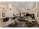 Open kitchen with an island and a view into the living room at 928 E Valencia Dr, Phoenix, AZ 85042