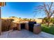 Outdoor kitchen area with built-in grill and prep space at 928 E Valencia Dr, Phoenix, AZ 85042