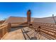 Private rooftop deck with city views and metal railing at 928 E Valencia Dr, Phoenix, AZ 85042