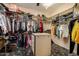 Spacious walk-in closet with custom shelving and drawers at 928 E Valencia Dr, Phoenix, AZ 85042