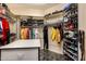 Large walk-in closet with plenty of shelving and hanging space at 928 E Valencia Dr, Phoenix, AZ 85042