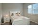 Bright bedroom with a white bed frame and plenty of natural light at 9343 W Cashman Dr, Peoria, AZ 85383