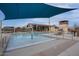 Community pool with a kiddie area and shade structures at 9343 W Cashman Dr, Peoria, AZ 85383