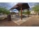 Relaxing covered picnic table in community at 9343 W Cashman Dr, Peoria, AZ 85383