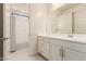 Modern bathroom with double vanity and large mirror at 9430 W Jj Ranch Rd, Peoria, AZ 85383