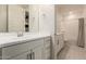 Clean bathroom with single vanity and shower/tub combo at 9430 W Jj Ranch Rd, Peoria, AZ 85383