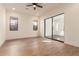 Bright bedroom with sliding glass doors leading to a patio at 9430 W Jj Ranch Rd, Peoria, AZ 85383