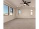 Spacious bedroom featuring a ceiling fan and ample natural light at 9430 W Jj Ranch Rd, Peoria, AZ 85383