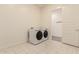 Bright laundry room with washer and dryer included at 9430 W Jj Ranch Rd, Peoria, AZ 85383