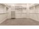 Large walk-in closet with ample shelving and hanging space at 9430 W Jj Ranch Rd, Peoria, AZ 85383