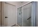 Bathroom with shower stall and tiled walls at 9455 E Raintree Dr # 2049, Scottsdale, AZ 85260