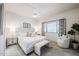 Spacious bedroom with plush bedding and plenty of natural light at 9455 E Raintree Dr # 2049, Scottsdale, AZ 85260