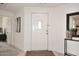 Inviting entryway with a white door and stylish decor at 9455 E Raintree Dr # 2049, Scottsdale, AZ 85260