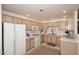 Modern kitchen featuring ample counter space and wood cabinets at 9455 E Raintree Dr # 2049, Scottsdale, AZ 85260