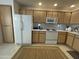 Well-equipped kitchen featuring modern appliances and ample cabinetry at 9455 E Raintree Dr # 2049, Scottsdale, AZ 85260