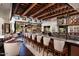 Upscale bar with wood accents and comfortable seating at 10040 E Happy Valley Rd # 1041, Scottsdale, AZ 85255