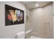 Bathroom with a glass shower, built-in bench, and large-format art at 10040 E Happy Valley Rd # 1041, Scottsdale, AZ 85255