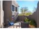 Private courtyard with seating and desert landscaping at 10040 E Happy Valley Rd # 1041, Scottsdale, AZ 85255