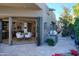 Open concept indoor-outdoor dining area with folding doors leading to a patio at 10040 E Happy Valley Rd # 1041, Scottsdale, AZ 85255