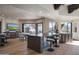 Open concept kitchen with island seating and access to outdoor area at 10040 E Happy Valley Rd # 1041, Scottsdale, AZ 85255
