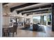 Spacious living room with hardwood floors, exposed beams, and stunning mountain views at 10040 E Happy Valley Rd # 1041, Scottsdale, AZ 85255