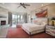 Luxurious main bedroom with fireplace, mountain views, and sitting area at 10040 E Happy Valley Rd # 1041, Scottsdale, AZ 85255