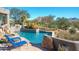 Inviting pool with mountain views and comfortable lounge chairs at 10040 E Happy Valley Rd # 1041, Scottsdale, AZ 85255