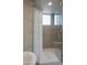 Large walk-in shower with glass enclosure and hexagon tile feature wall at 10040 E Happy Valley Rd # 1041, Scottsdale, AZ 85255