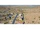 Aerial view of community and surrounding landscape at 10062 W Redbird Rd, Peoria, AZ 85383