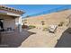 Backyard with hot tub, fire pit, and patio at 10062 W Redbird Rd, Peoria, AZ 85383
