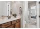 Guest bathroom with vanity and shower at 10062 W Redbird Rd, Peoria, AZ 85383