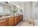 Bathroom features double sinks, granite countertops, and a large walk-in shower at 10062 W Redbird Rd, Peoria, AZ 85383