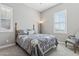 Charming bedroom with window and seating at 10062 W Redbird Rd, Peoria, AZ 85383