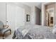Spacious bedroom with double doors and closet at 10062 W Redbird Rd, Peoria, AZ 85383