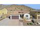 Stunning home exterior with two-car garage at 10062 W Redbird Rd, Peoria, AZ 85383