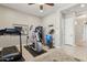 Bright home gym with cardio and strength training equipment at 10062 W Redbird Rd, Peoria, AZ 85383